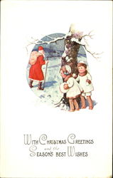 Two children peeking at Santa from behind tree Postcard