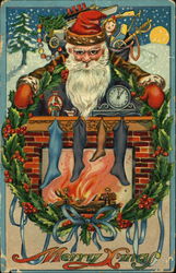 Santa behind fireplace Postcard