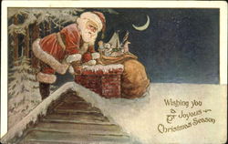 Santa on rooftop with presents Postcard