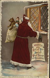 Santa with a red robe delivering presents Santa Claus Postcard Postcard