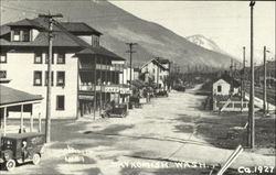 Skykomish's main street by Lee Pickett 1889 Washington Postcard Postcard