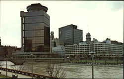 Across the River from First Federal Plaza and the Americana Hotel Postcard