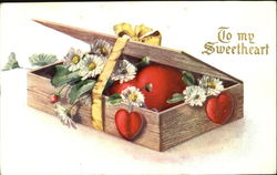 Ribboned box containing hearts and flowers Romance & Love Postcard Postcard