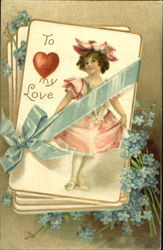 Girl on top card of playing cards, bound with blue ribbon Postcard