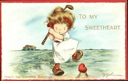 Girl Golfer Swinging at a Heart-Shaped Golf Ball Postcard