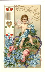 Cupid sitting atop a flower heart with flower at bottom Postcard