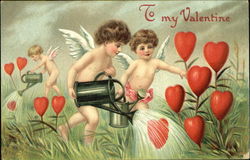 Three cupids watering a garden of hearts Postcard