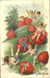 Cupids with hearts in ribbons Postcard