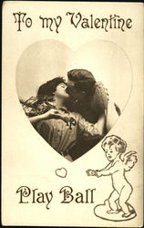 Female baseball player kissing a man Postcard