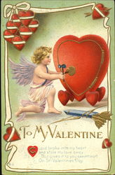 A cupid opening a heart shaped safe Postcard Postcard