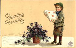 Boy holding cards standing next to flowers Postcard