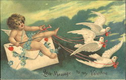 Cupid sitting on card, ribons as reins on doves Postcard