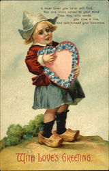 A Dutch boy holding a heart with blue flowers Postcard