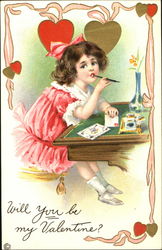 Pink-frocked girl sitting at desk writing cards Children Postcard Postcard