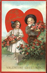 Girl and boy holding baskets of red flowers Postcard