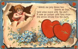 Male cupid shooting a arrow through two red hearts Postcard