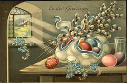 Collection of Easter eggs on a table with flowers Postcard