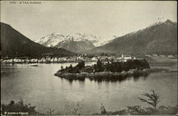 Scenic view of the town, mountain, and water Postcard