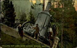 Pulling out logs with donkey engine Postcard