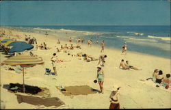 Sunbathers at the Beach Postcard