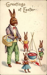 How Bunnies Dye Easter Eggs: Father and little Bunnies With Bunnies Postcard Postcard