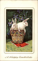 Two Bunnies in a basket With Bunnies Postcard Postcard