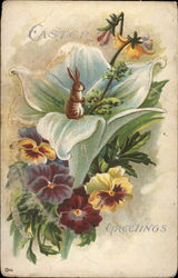 A Wee Bunny Amidst Pansies and a Lily With Bunnies Postcard Postcard