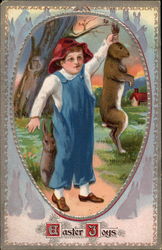 Boy in Overalls Holds Bunny Up by the Ears With Children Postcard Postcard