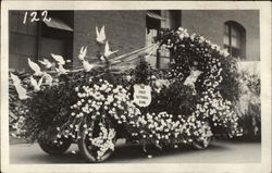 The First National Bank, flowered parade float Postcard