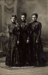 Three Women in Black Dresses Postcard