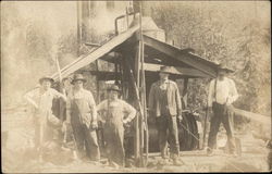 Laborers Posed Beside a Machine Postcard