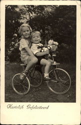 German Kids on Tricycle Postcard