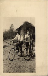 Two Men with Their Bicycles Postcard Postcard