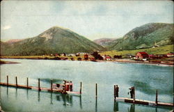 Palmer Lake with mountains in the background Postcard