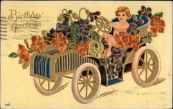 Cherub driving a car with flowers Postcard