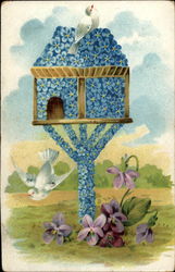 Blue floral birdhouse with doves Postcard