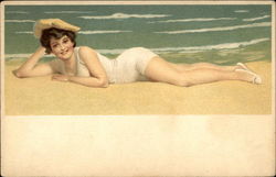 Woman lying on the beach Postcard