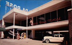 Velda Rose Motel, tourists, old Buick at lobby Postcard