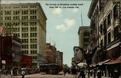 The crowds on Broadway looking south from Fifth St Postcard