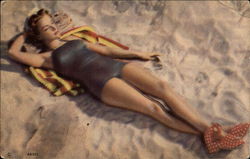 Beautiful Woman Sunbathing on the Beach Swimsuits & Pinup Postcard Postcard