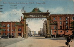 Welcome Arch, looking up 17th St Denver, CO Postcard Postcard