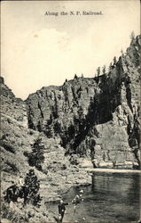 Along the NP Railroad Postcard