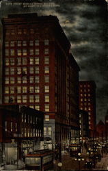 Sixth Street showing Hippee Building at Night Des Moines, IA Postcard Postcard