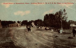 Street Scene, Looking North; C.M. & P.S. Railway Depot in the Distance Postcard