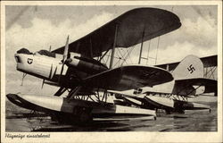 Flugreuge eubsatrberceit (Seaplane with Nazi ensignia) Postcard