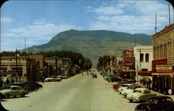 Main Street and Business District Cody, WY Postcard Postcard