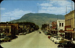 Main Street and Business District Cody, WY Postcard Postcard