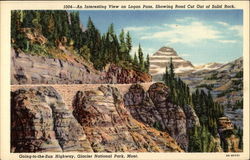 An Interesting View on Logan Pass, Showing Road Cut Out of Solid Rock, Going-to-the-Sun Highway Glacier National Park, MT Postca Postcard