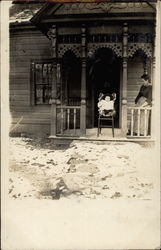 Baby in High Chair Postcard