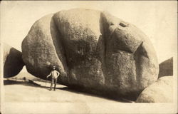 Man before a large rock Men Postcard Postcard